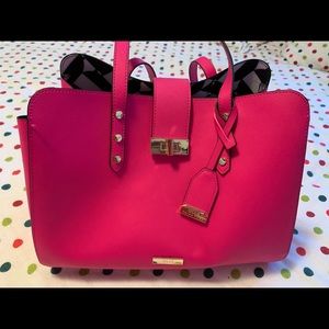 Trina Turk pink handbag with gold metal accents